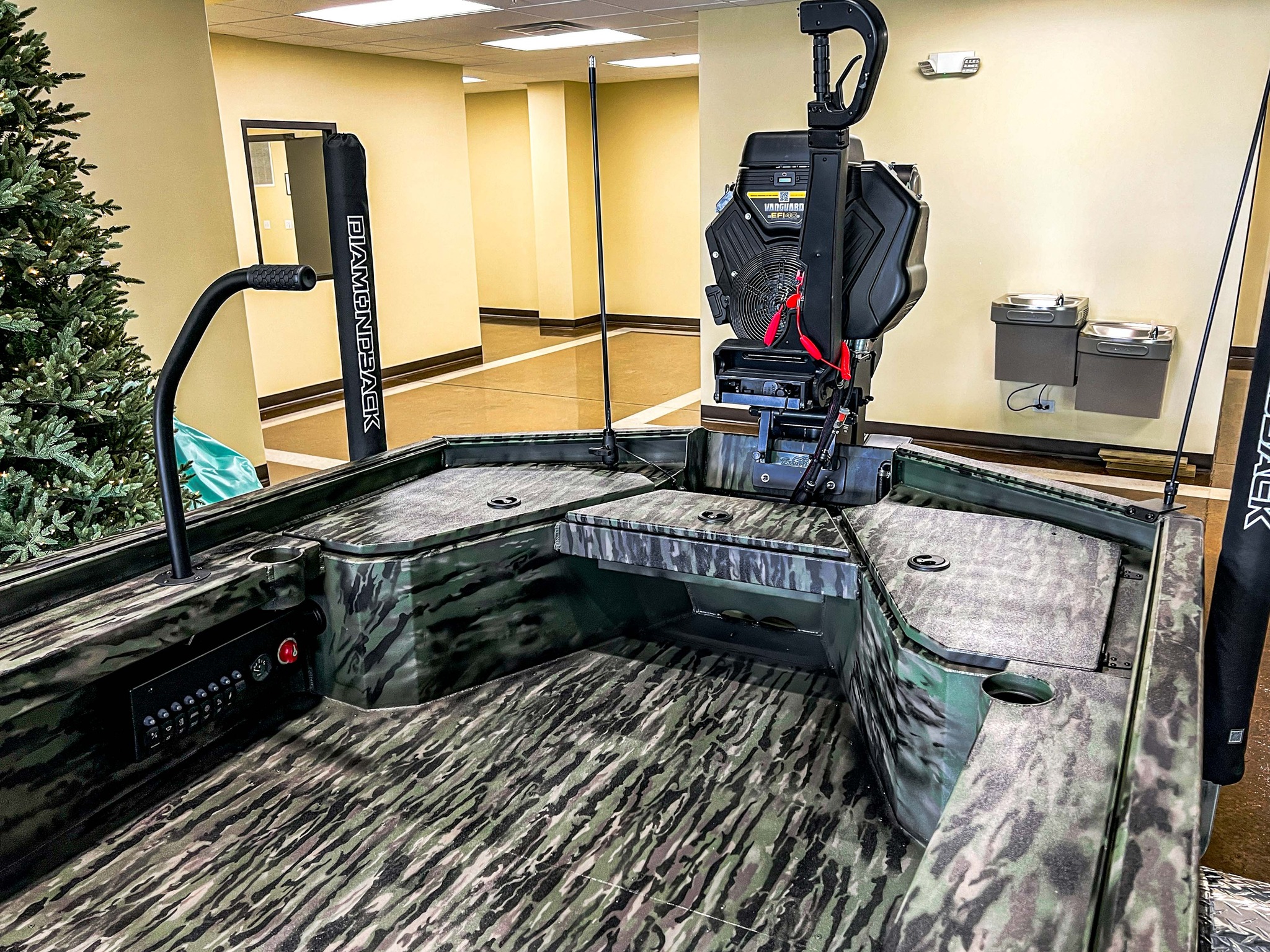 Diamondback Mud Rattler boat with Realtree paint job and Gator