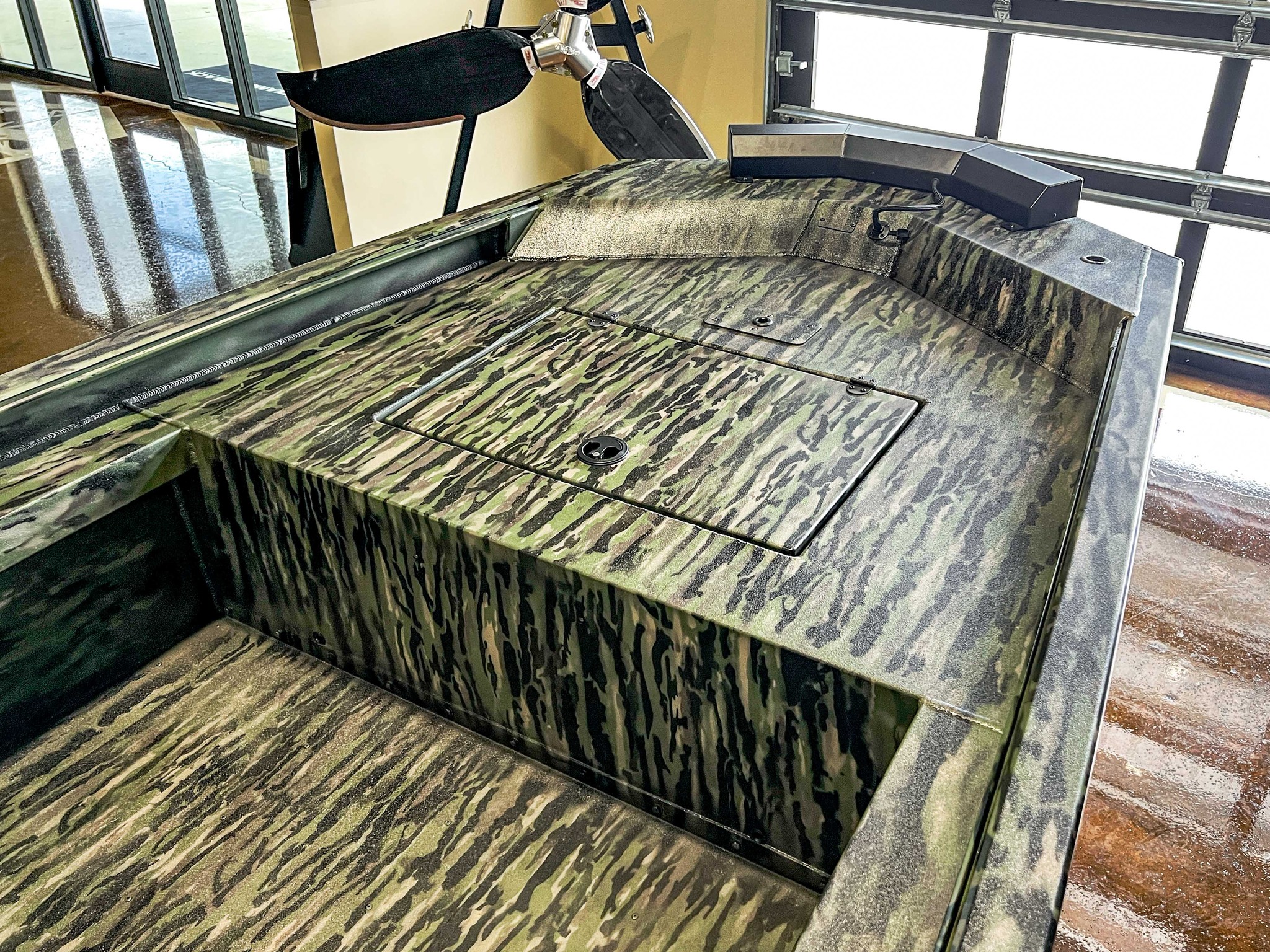 Diamondback Mud Rattler boat with Realtree paint job and Gator