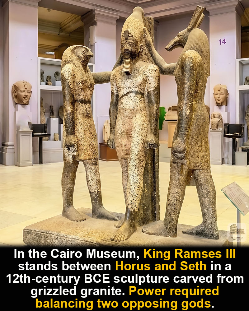 Ramses III statue between Horus and Seth in Cairo Museum