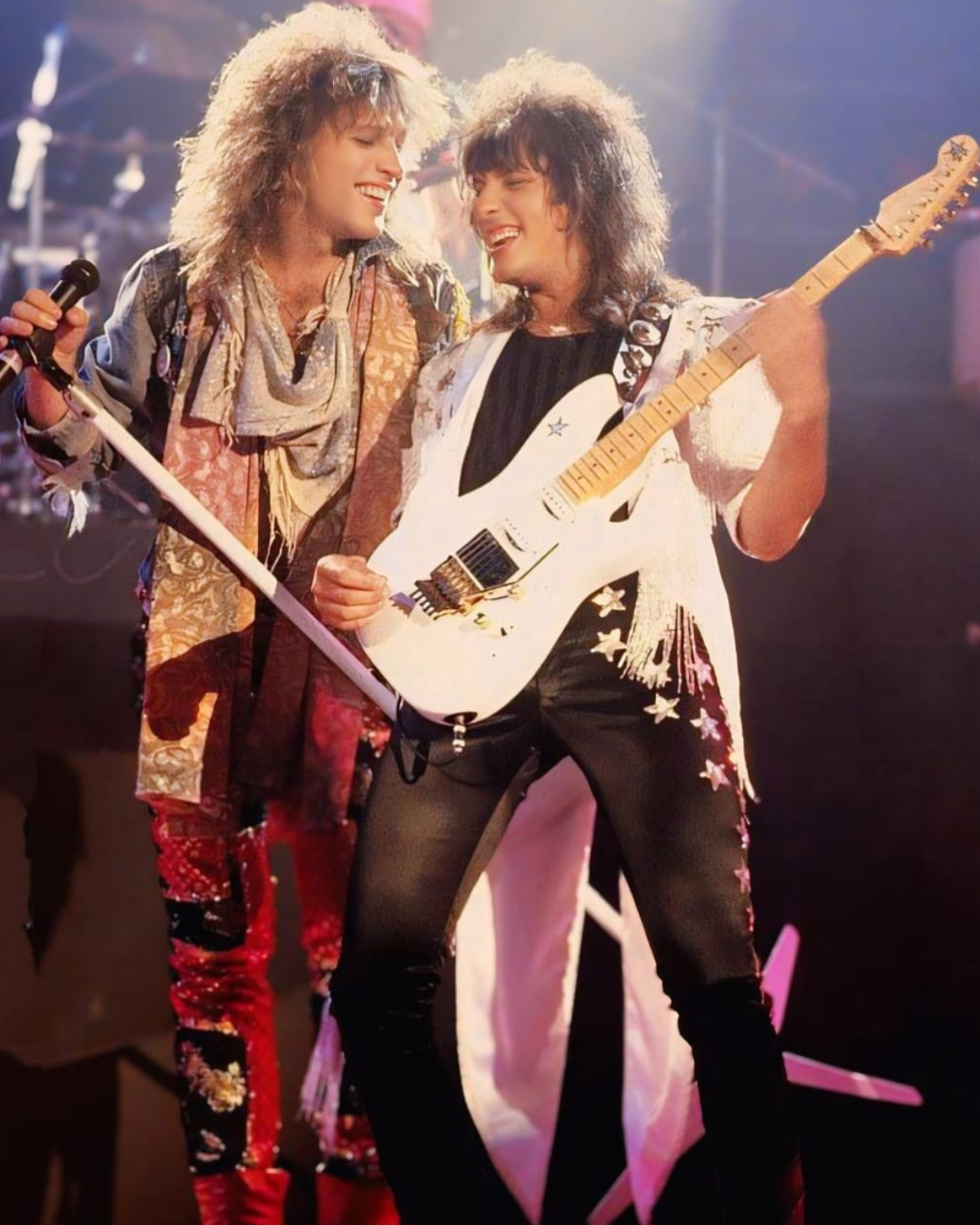 Jon Bon Jovi and Richie Sambora performing with Bon Jovi at the