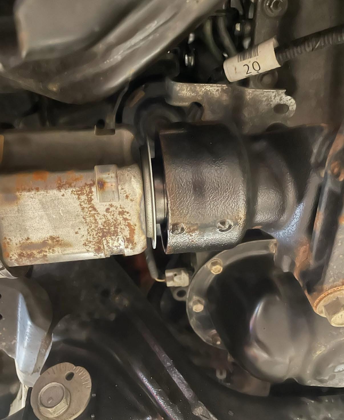 How to deal with Toyota's warranty claim for axle boot damage?