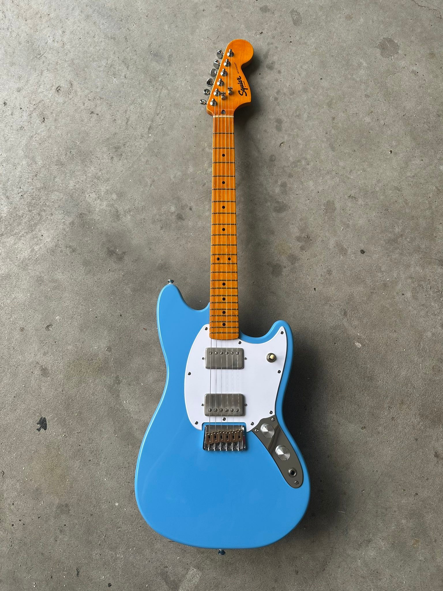 A Custom Sonic Squier Mustang in that beautiful California Blue. A