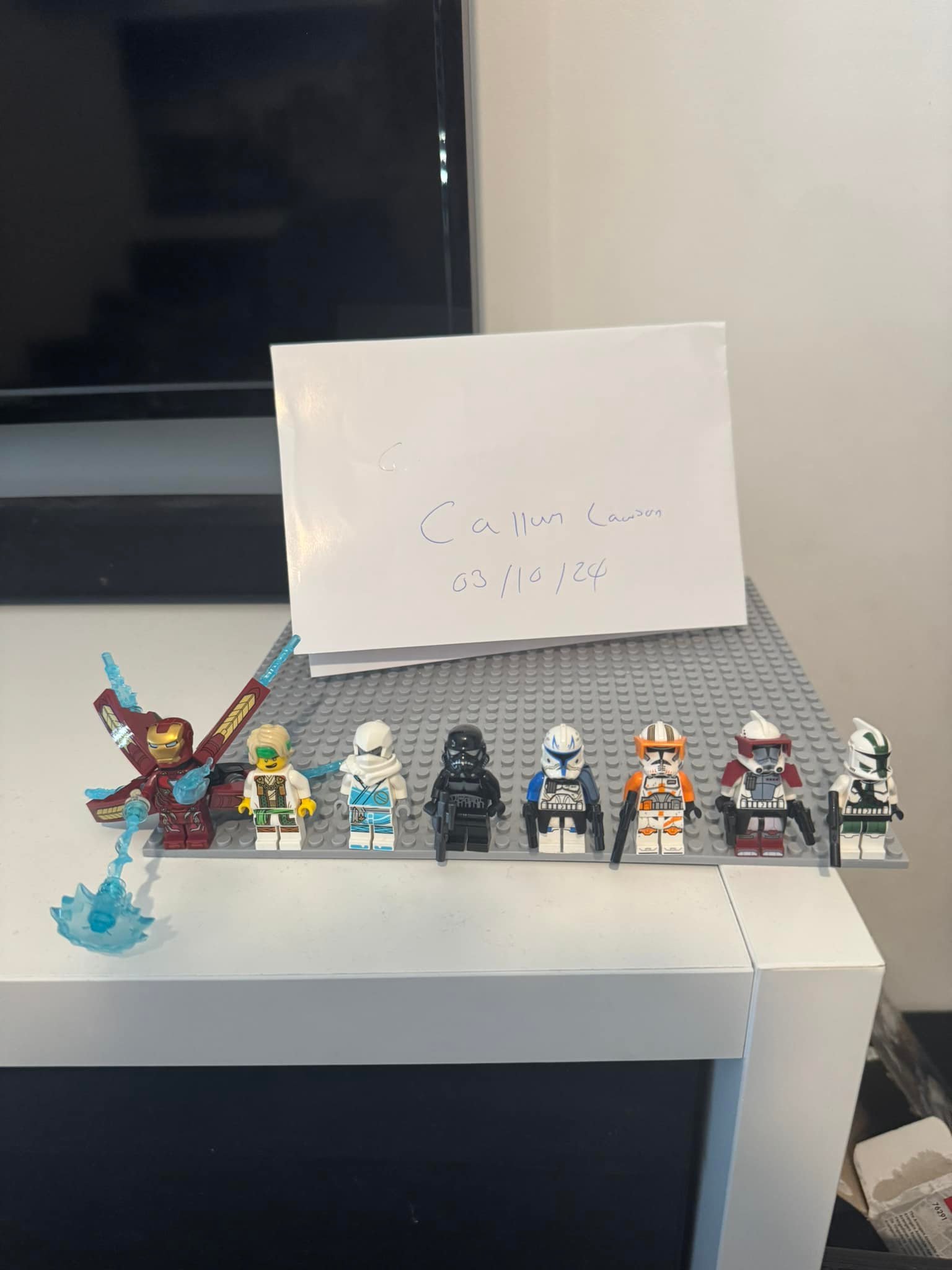 Lego minifigures for sale including Iron Man and Ninjago