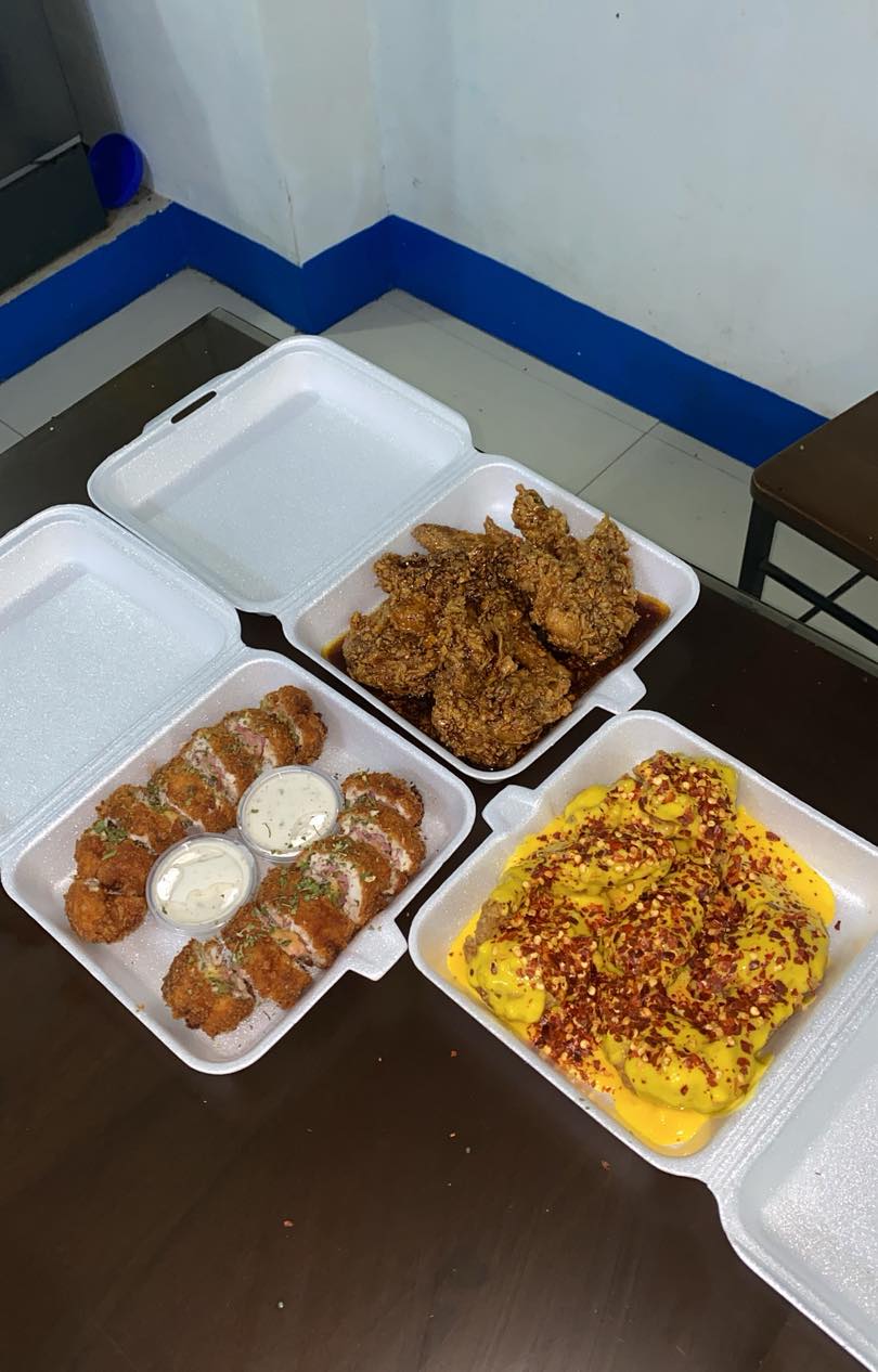 Flavored chicken wings and sandwiches at Mkitchen open until 3am