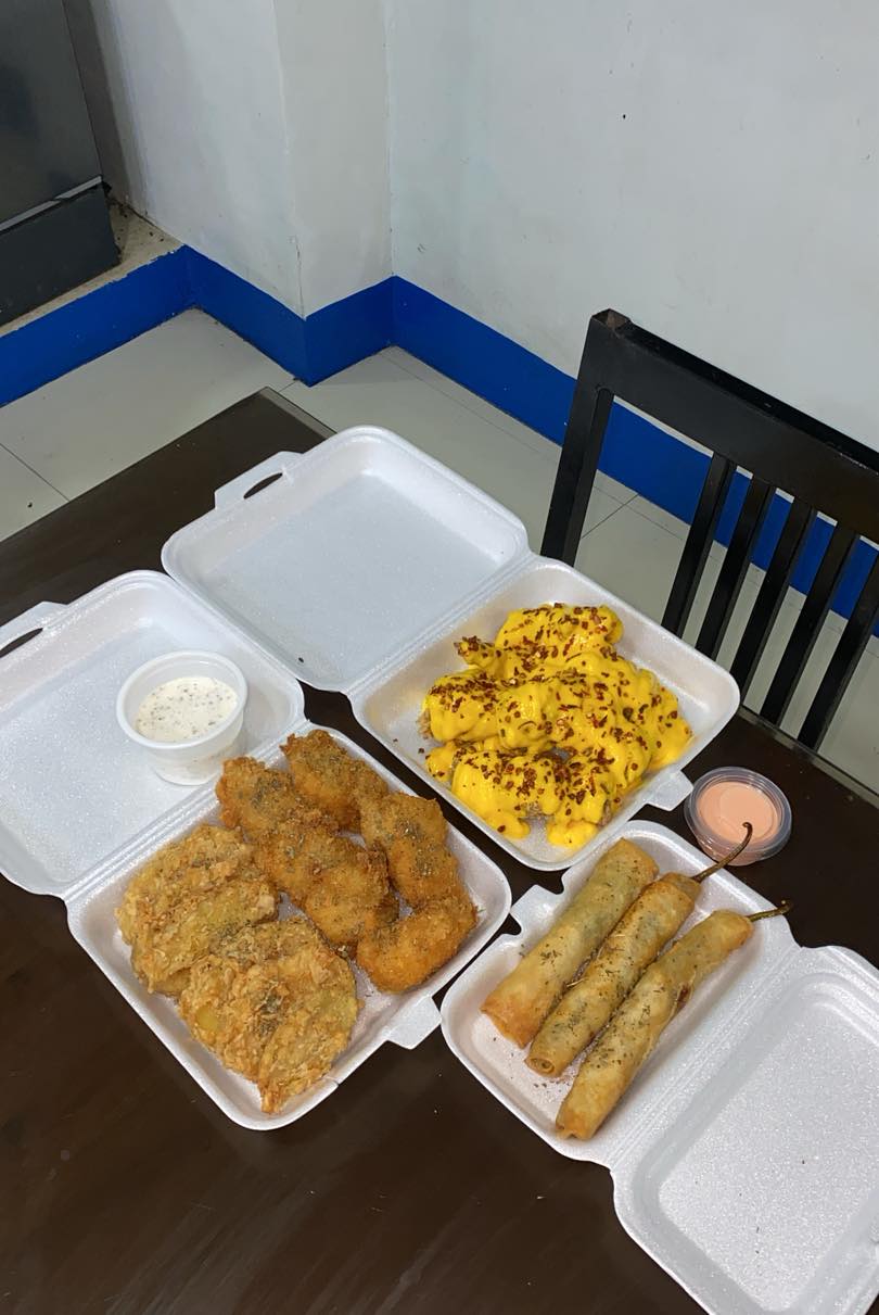 Flavored chicken wings and sandwiches at Mkitchen open until 3am