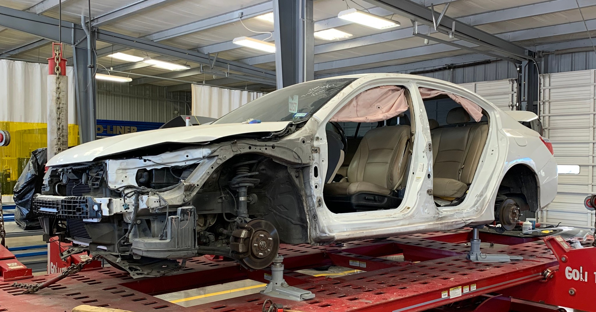Expro - Up on the lift and getting a fresh start. This Honda Accord is ...