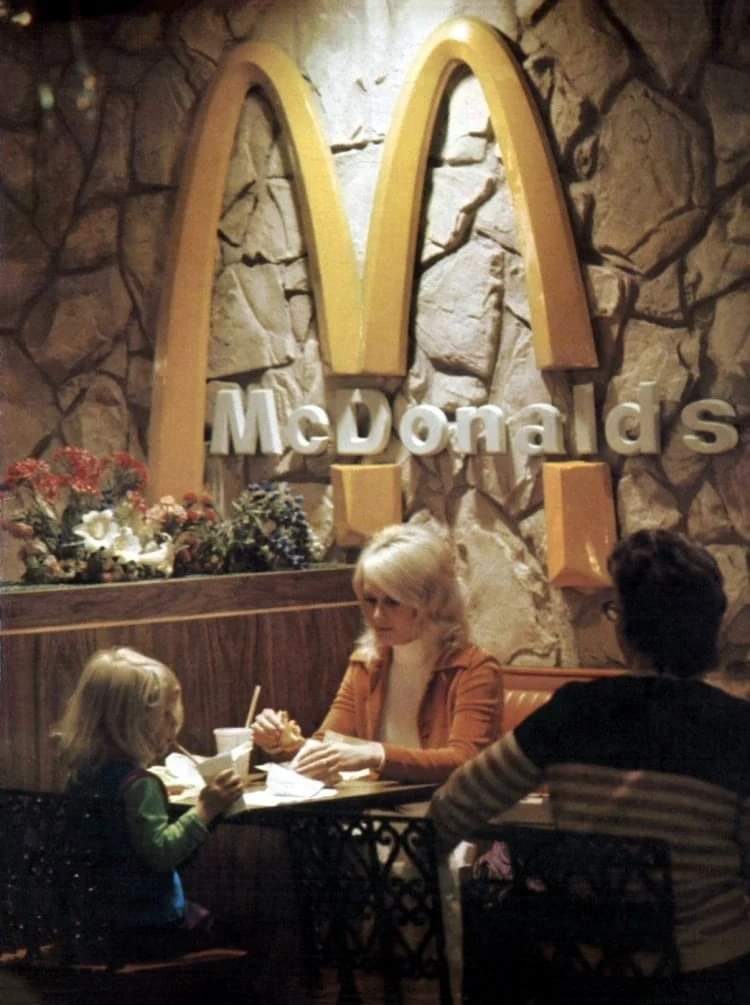 The outdoor area of a McDonald's in the 1970s.