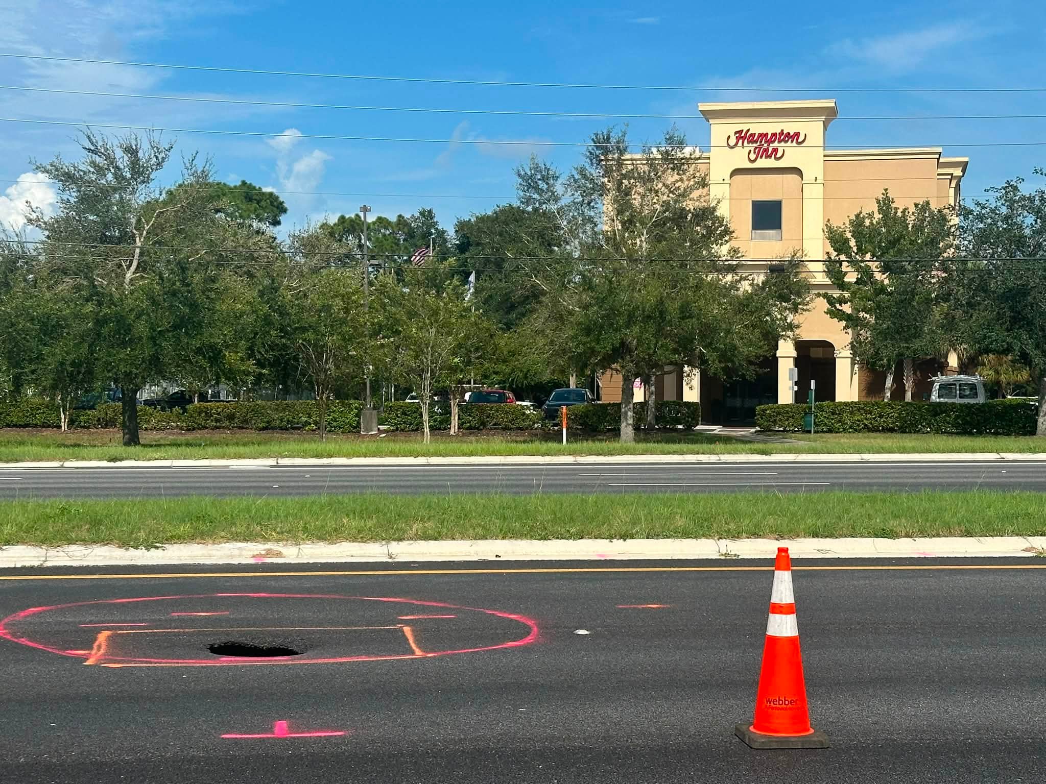 How would you describe this hole in the road? SINK HOLE 🕳️ OR