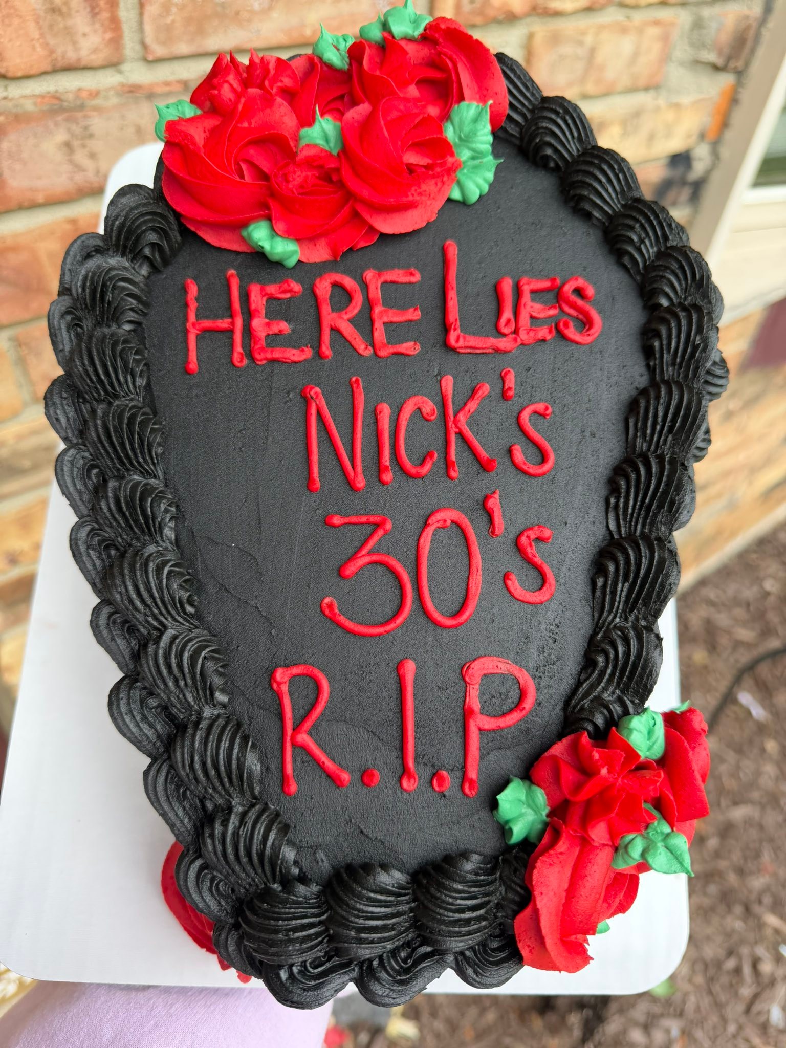 Nick's 40th birthday coffin cake with red roses