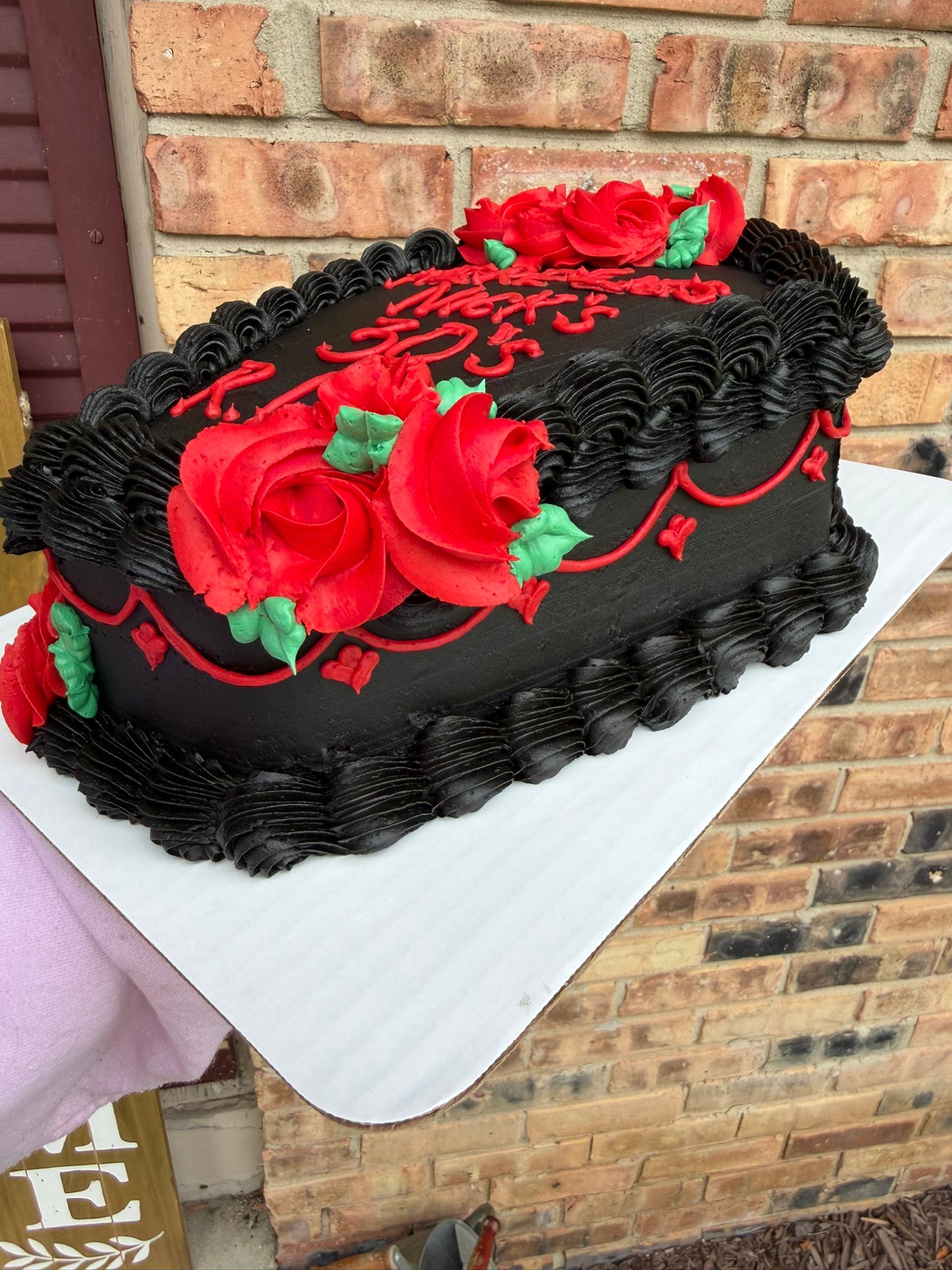 Nick's 40th birthday coffin cake with red roses