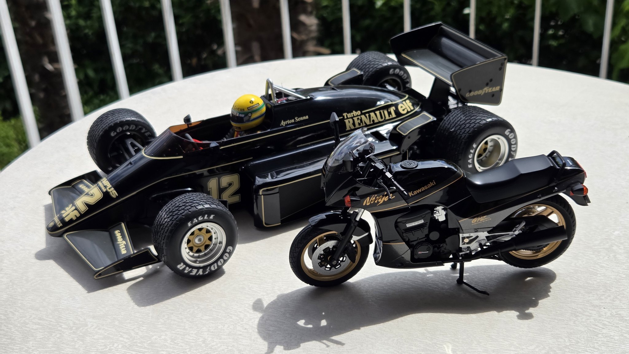 Black and gold Lotus Renault 97T and Kawasaki GPZ900R models