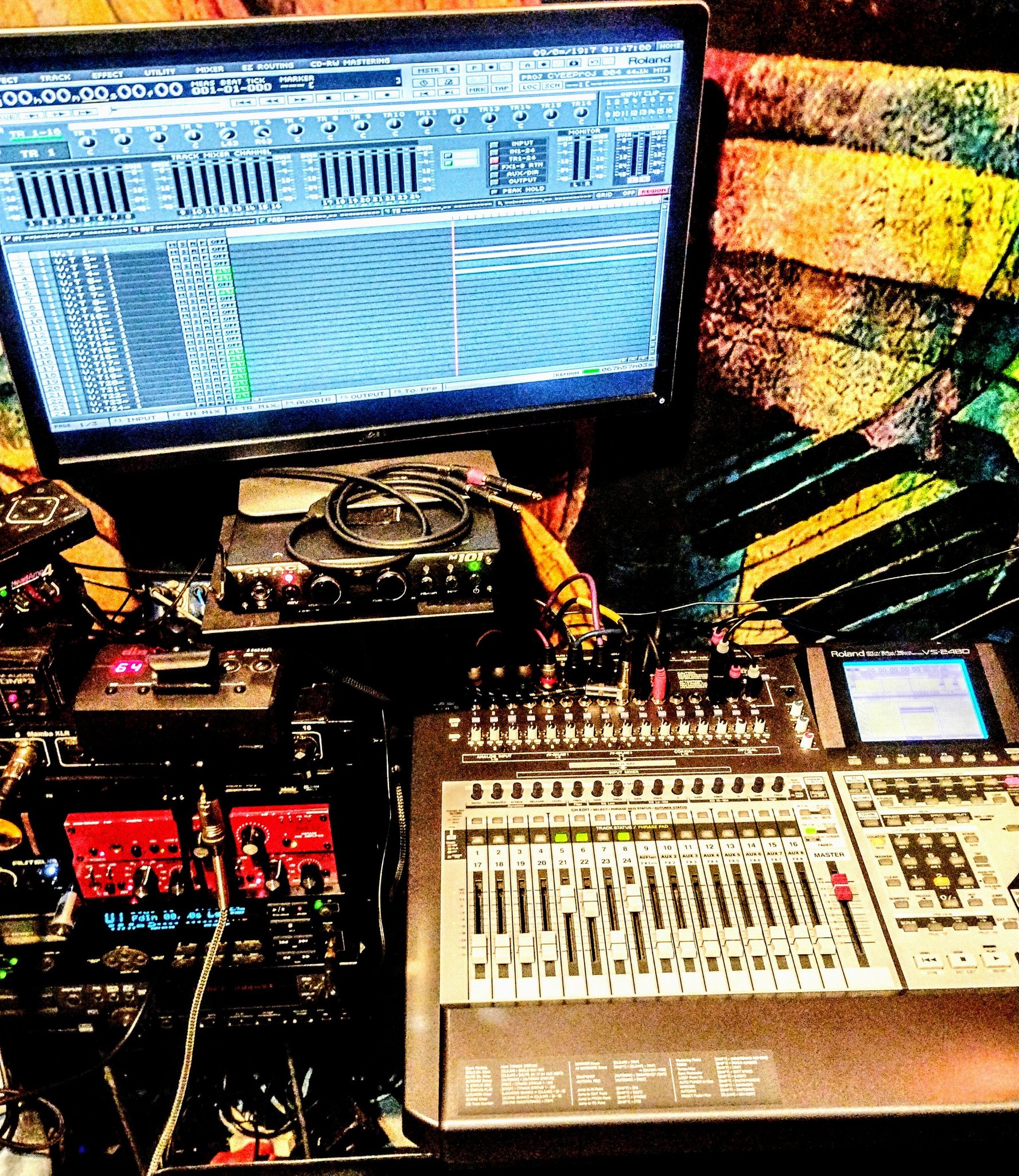 In between the four-track cassette tape recorders and laptops