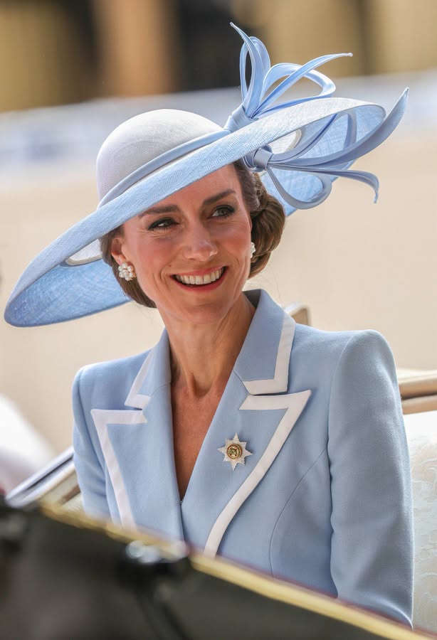 She doesn't need a crown to look regal. Radiating elegance in soft powder blue, Catherine, Princess of Wales arrives for Trooping the Colour 2026. From the beautifully tailored coat dress to the