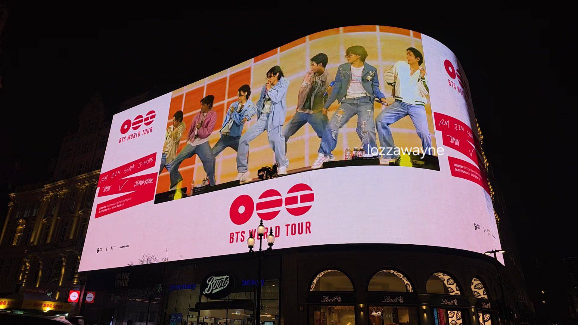 BTS WORLD TOUR promo on the big screen at Piccadilly Circus