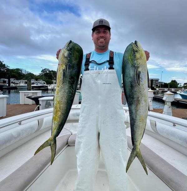 Man catches large Mahi-Mahi fish offshore