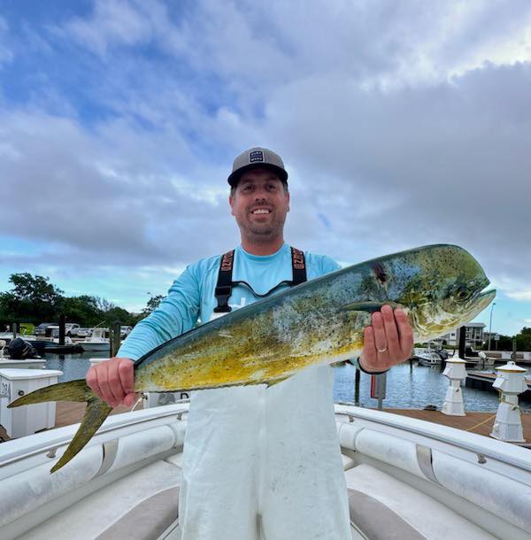 Man catches large Mahi-Mahi fish offshore