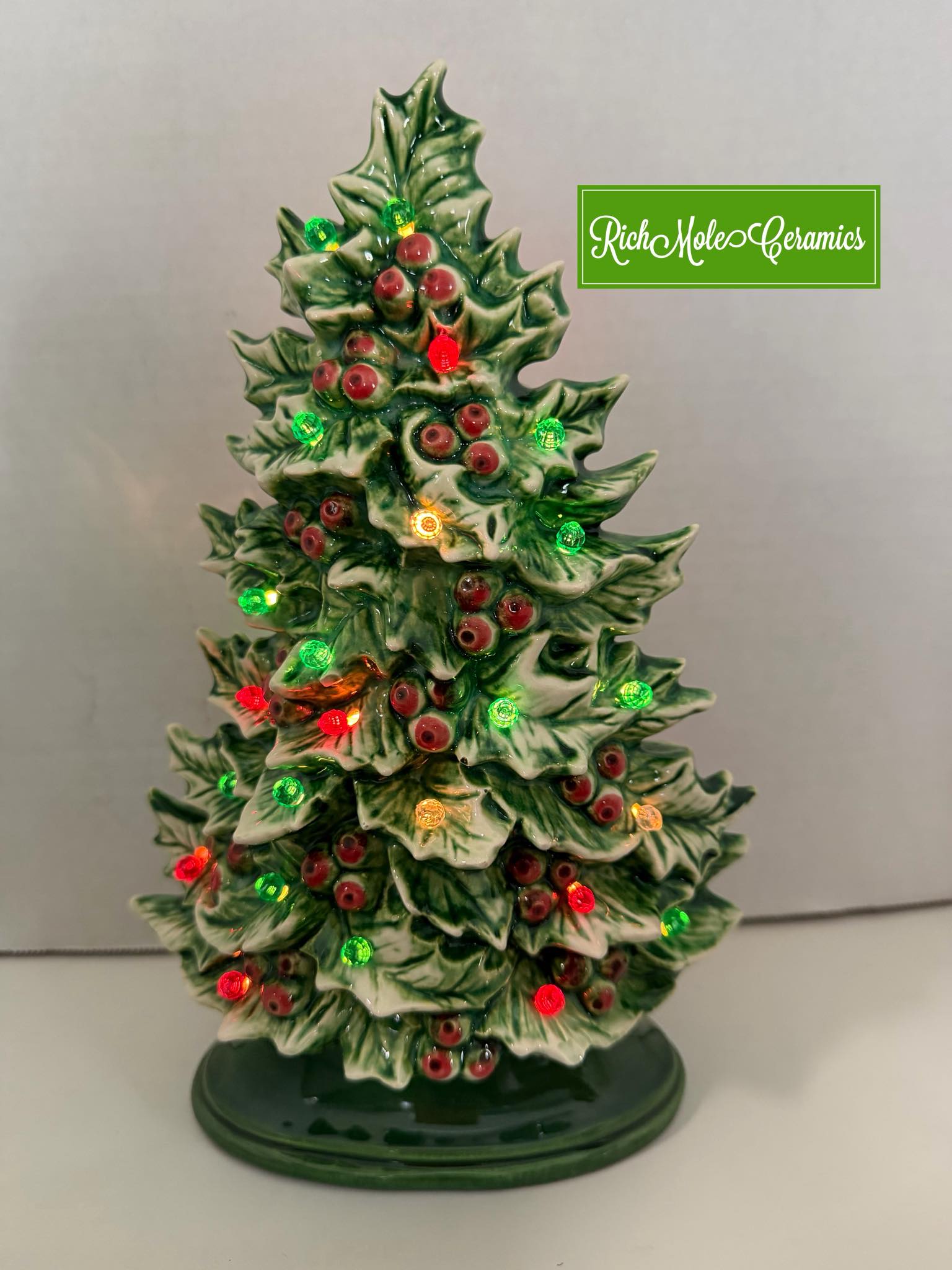 SOLD This Holly tree is about 10.5”. I glazed this tree and used