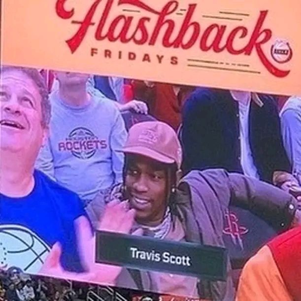 Rappers on the jumbotron Hashback - FRIDAYS ROCKETS Travis