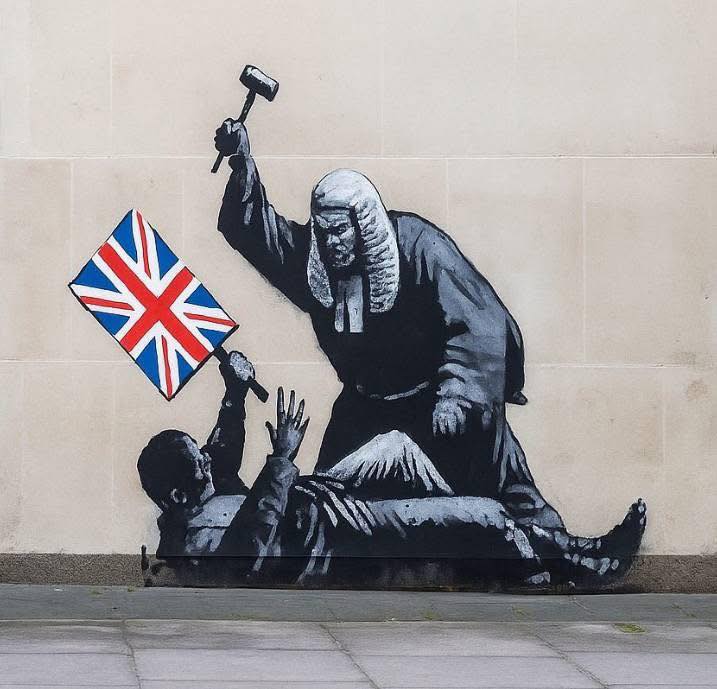 A painting by @Banksy was recently seen outside the Royal Courts
