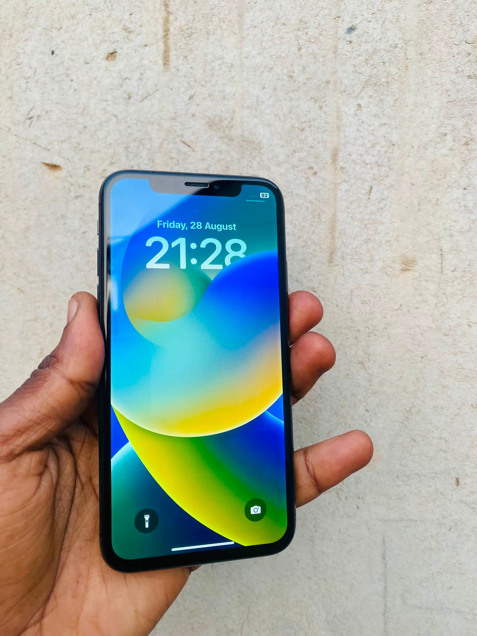 iPhone X 64GB for sale with Face ID, clear cameras, and no cracks