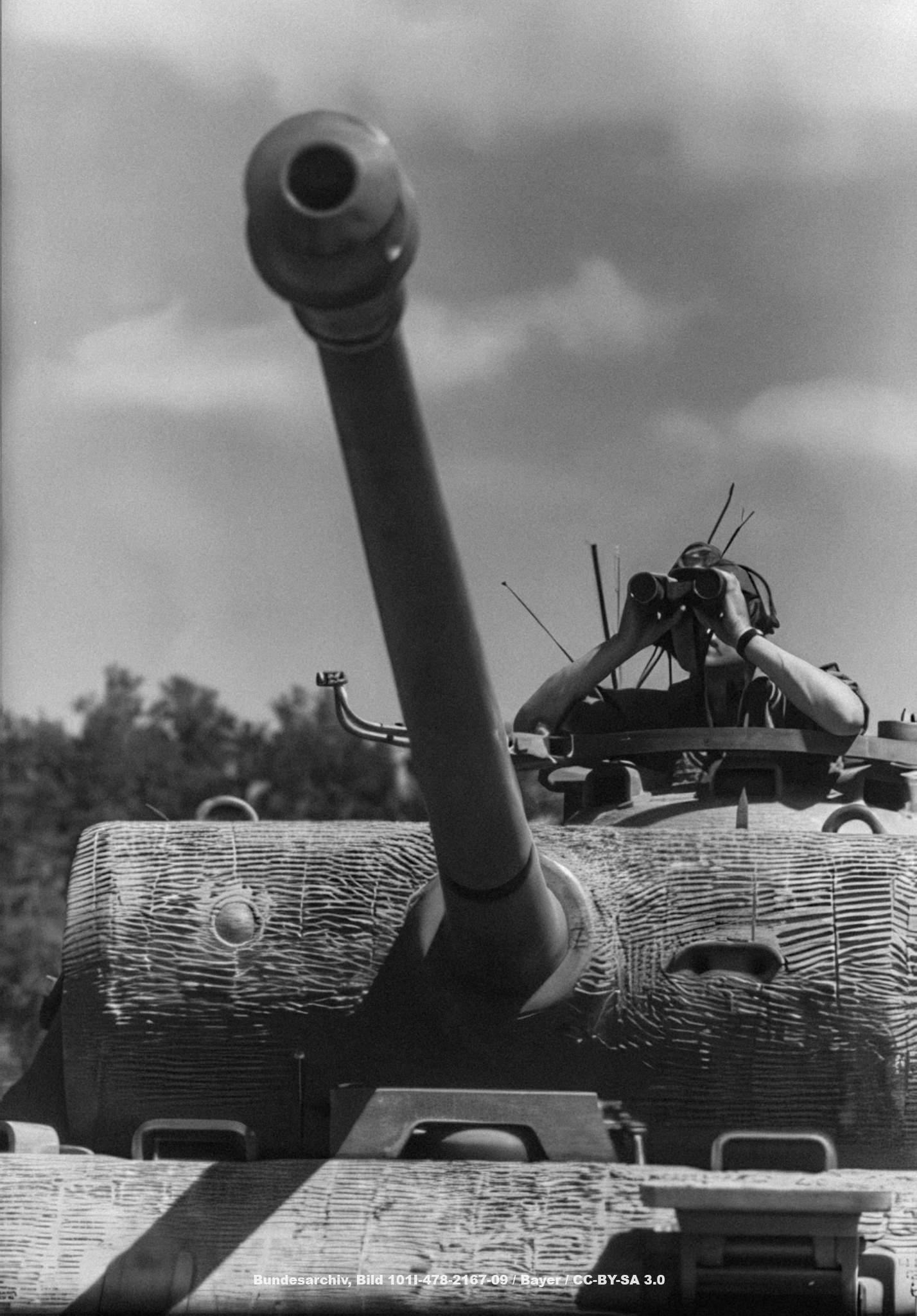 Tank soldier with headphones on a Panzer III (with the turret of a