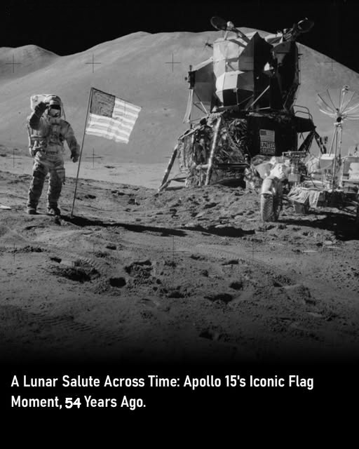 Apollo 15 astronaut James Irwin salutes the flag