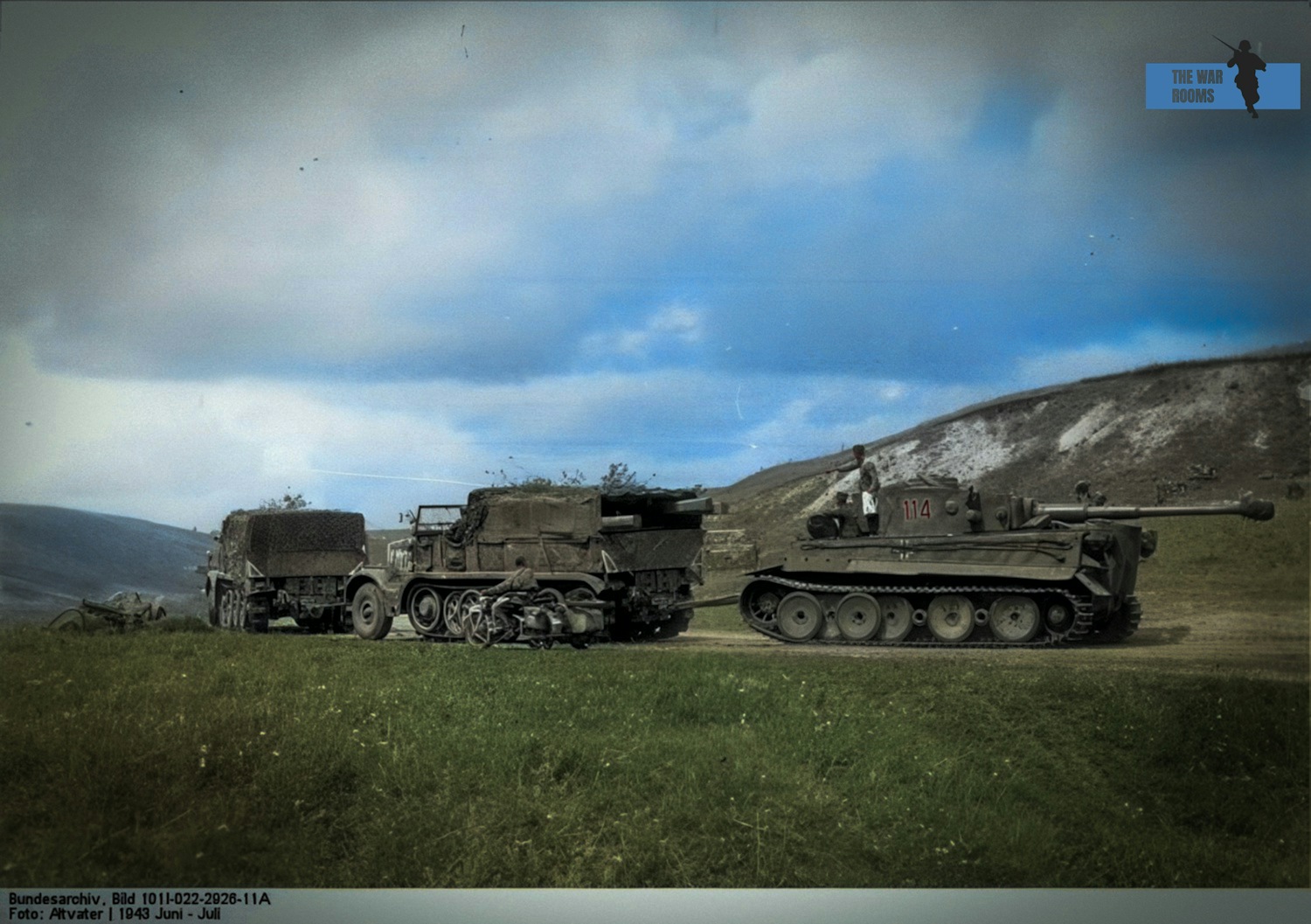 A German SdKfz. 9 halftrack vehicle tows a Panzer VI Tiger I heavy