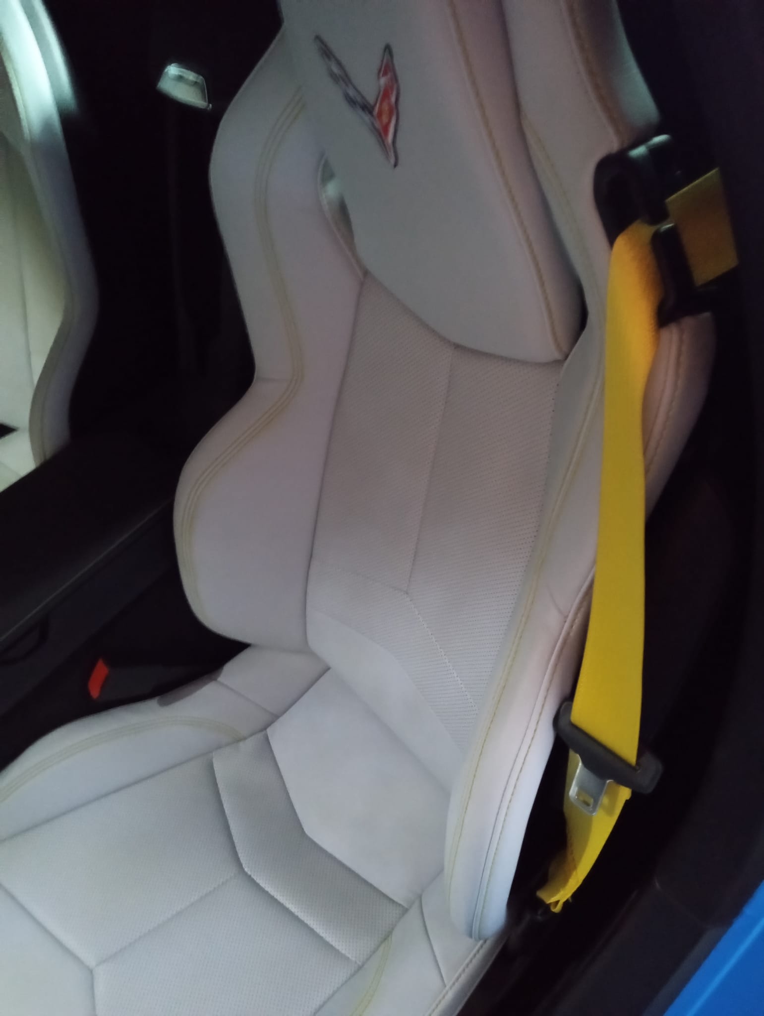 Yellow stitching on the seats is finished.