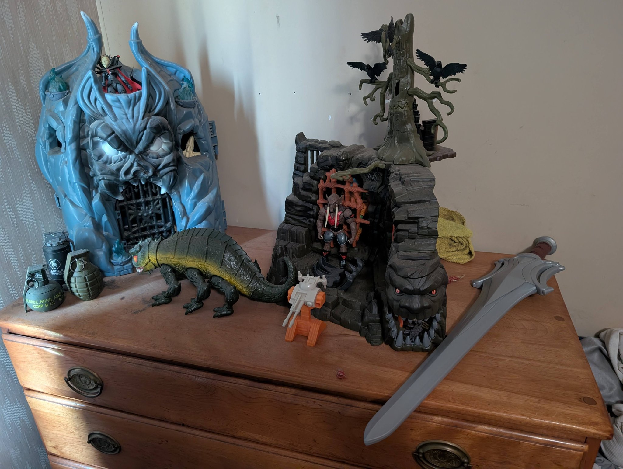 MOTU collection with DC Primal Age Bat Cave as Hordak's base