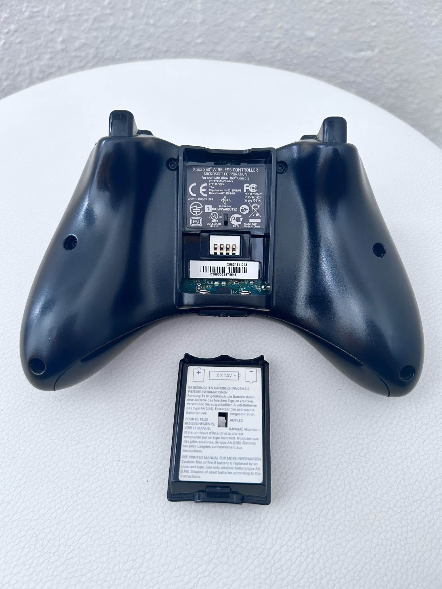 Authentic Microsoft Xbox 360 wired controller in black. This