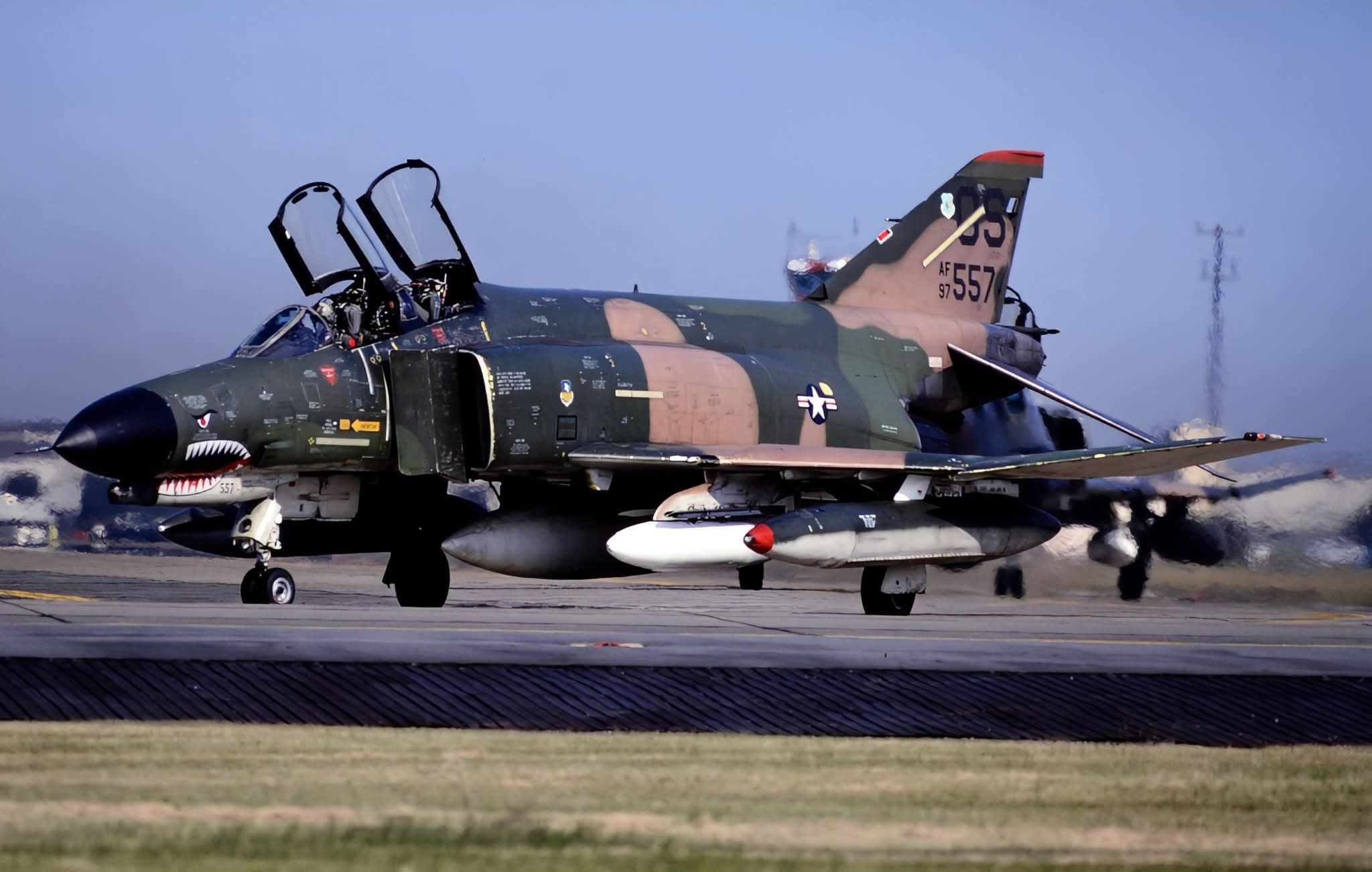 Here is a photo of a South East Asian (SEA) camouflage F-100 Hun
