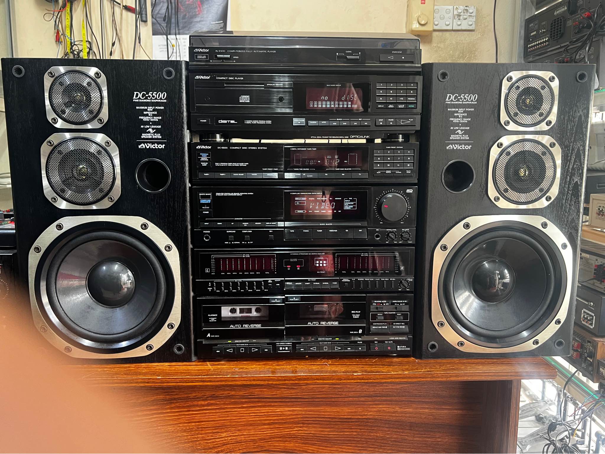 The Victor DC-5500 is a vintage stereo component system that