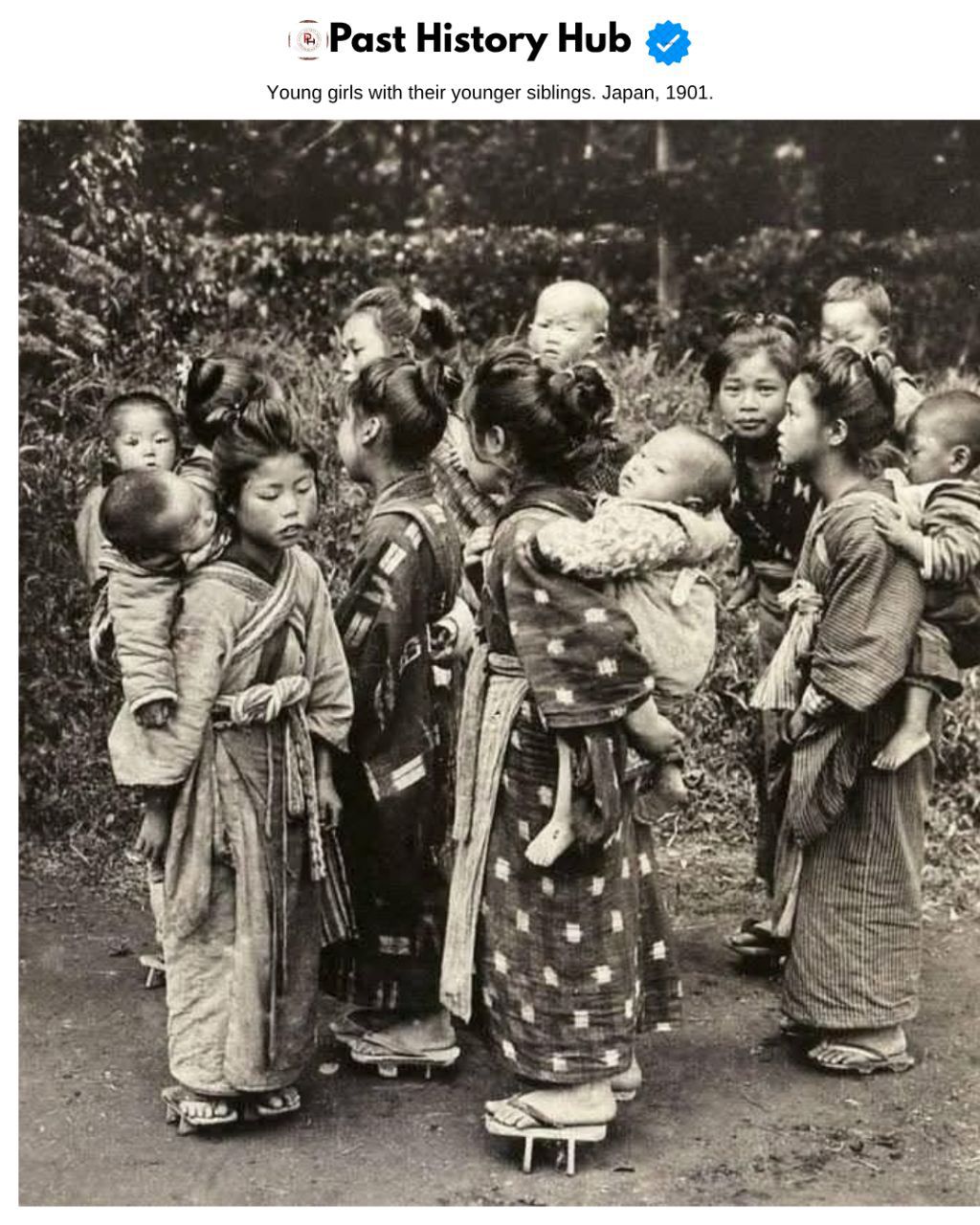 Young girls with their younger siblings. Japan, 1901.