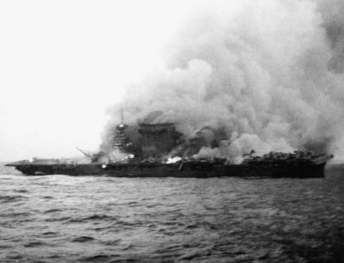 USS Lexington (CV 16) pictured underway recovering aircraft on