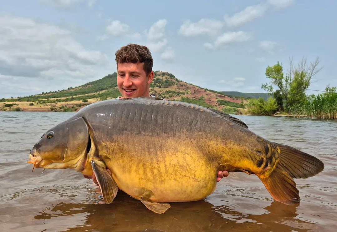 Michel Schoenmakers lands 112lb mirror carp at Euro Aqua