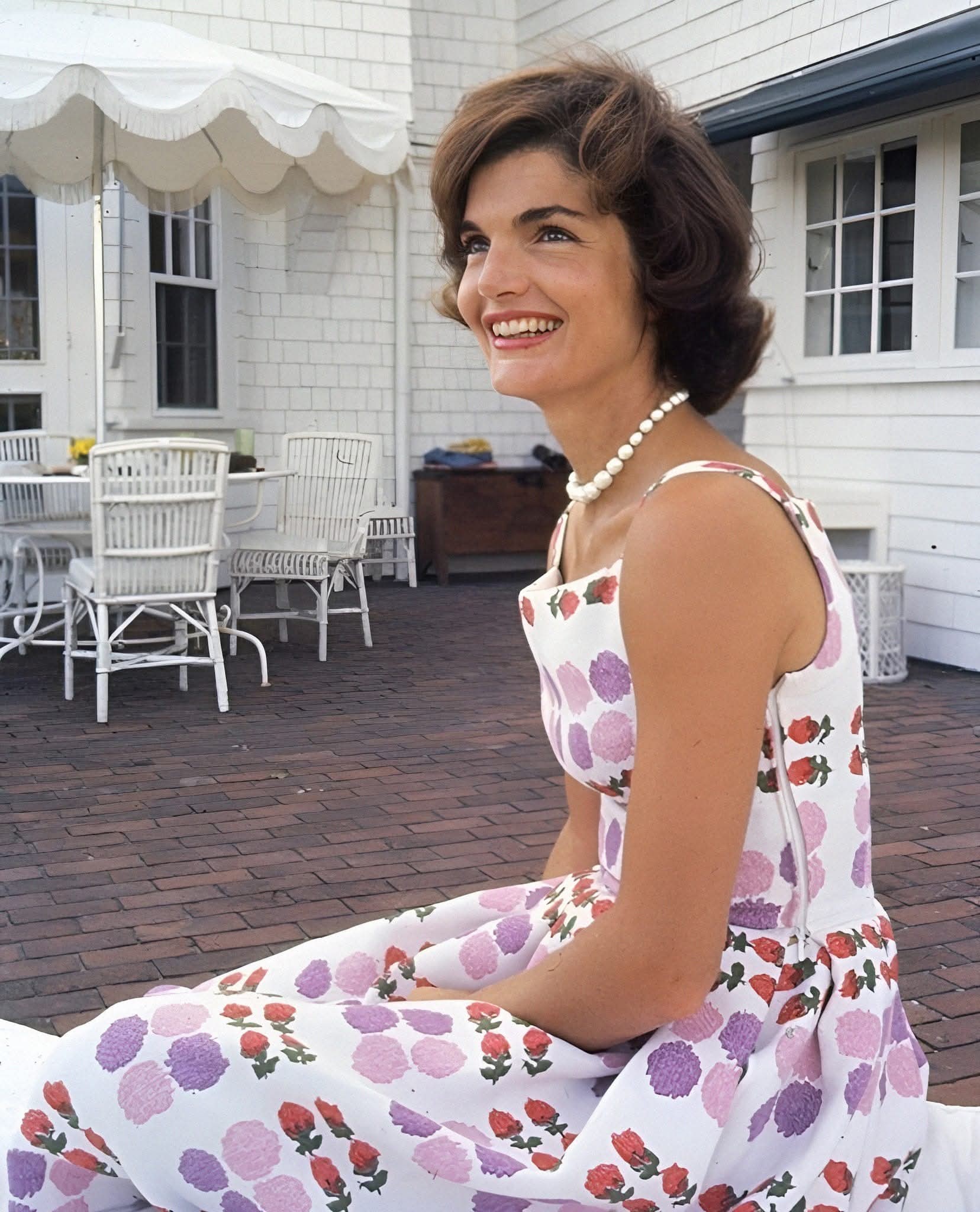 jackie kennedy dress Jacqueline in Hyannis Port, wears a floral print summer dress. August 1959. Photo by Phillip Harrington. Source : Harrington Archive Collection: MODERN SULTRY Ready for the night? Inauguration Color:Black (USNA Flying Cross)