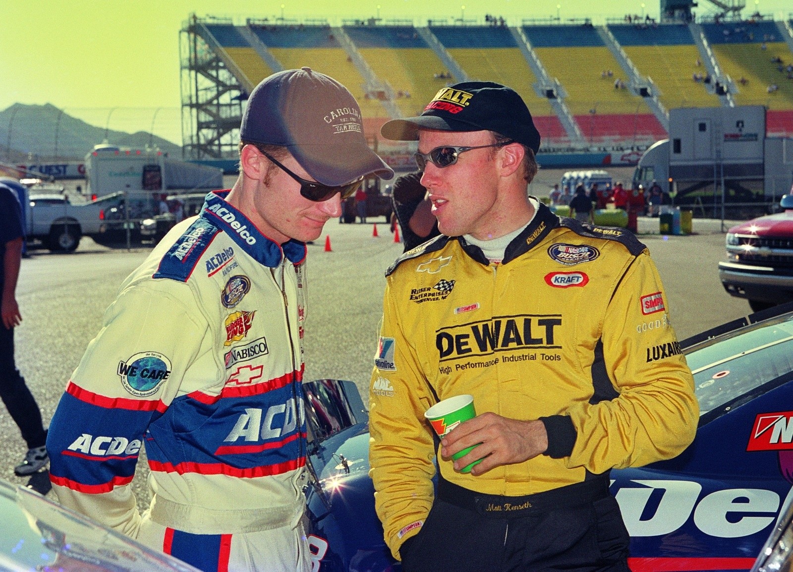Dale Earnhardt Jr. with Matt Kenseth talk during practice for the