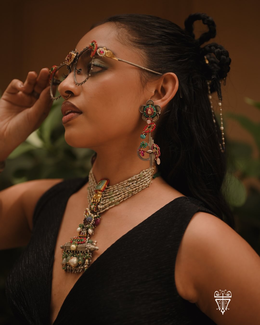 She'll wear temple jewellery to brunch. Vintage silver with a black dress. And sunglasses that deserve their own personality. She never saw heritage as something to save for special occasions. She wears