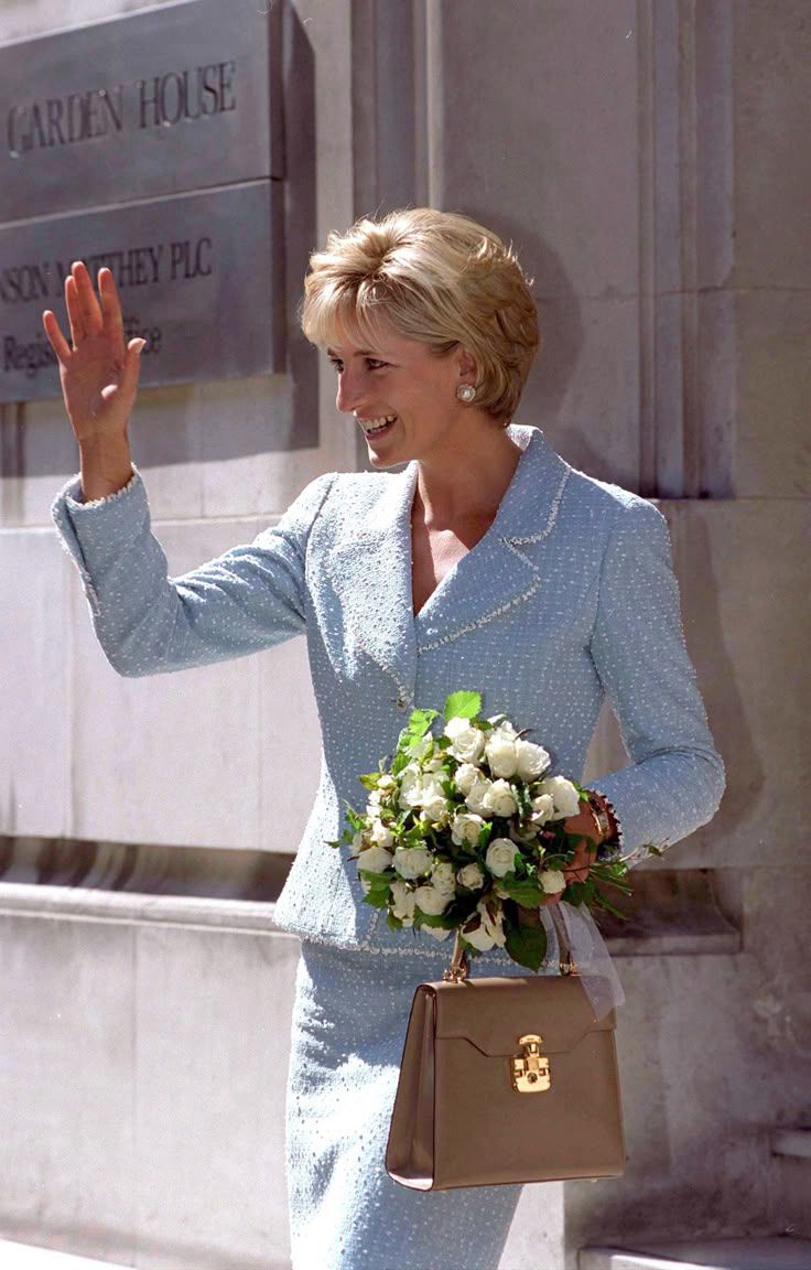 what dress was lady diana buried in Princess Diana's iconic Chanel mourning outfit winter-global-merch-boost