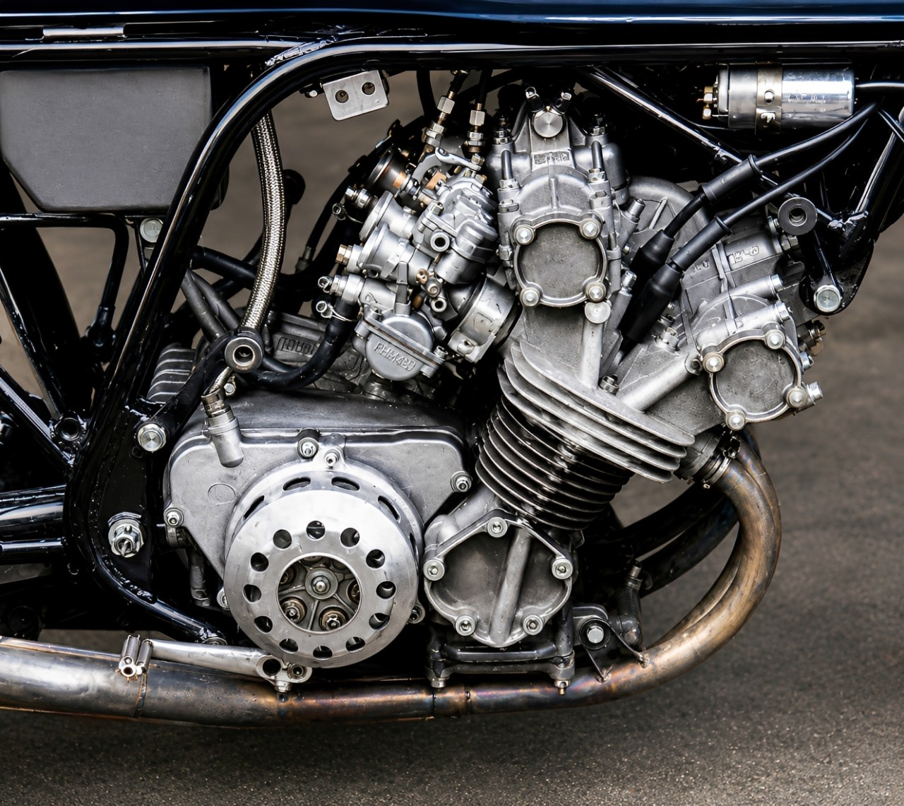 The Honda MVX250F engine is a two-stroke 90-degree V3 (yes, V3
