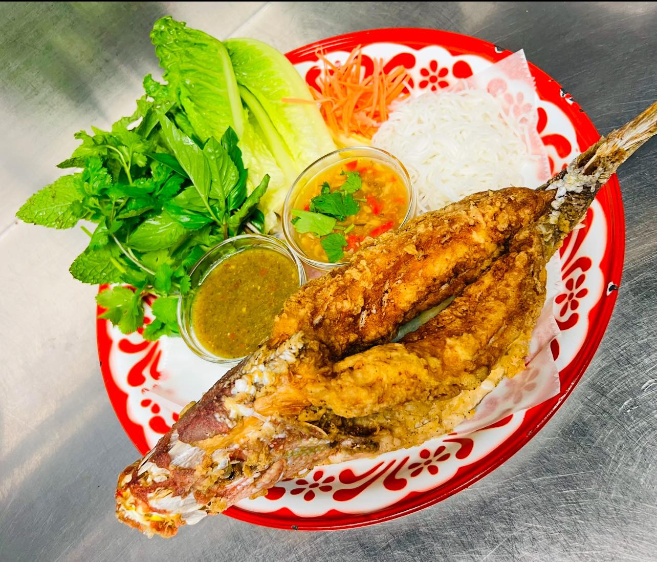 Thai - “MIANG PLA”, a traditional Thai-style fish wrap. It features a ...