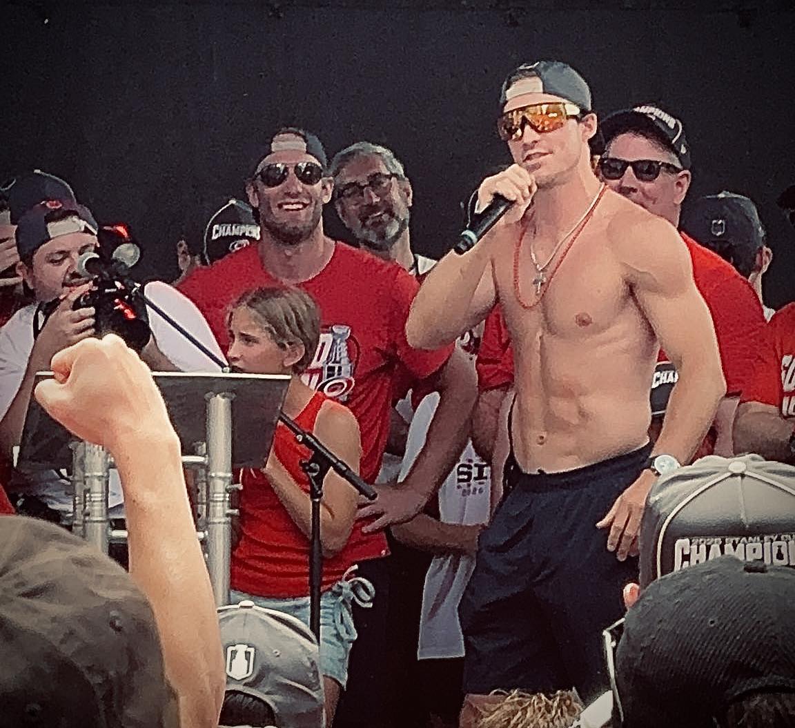 Shirtless, shades on, chains swinging Andrei Svechnikov is living
