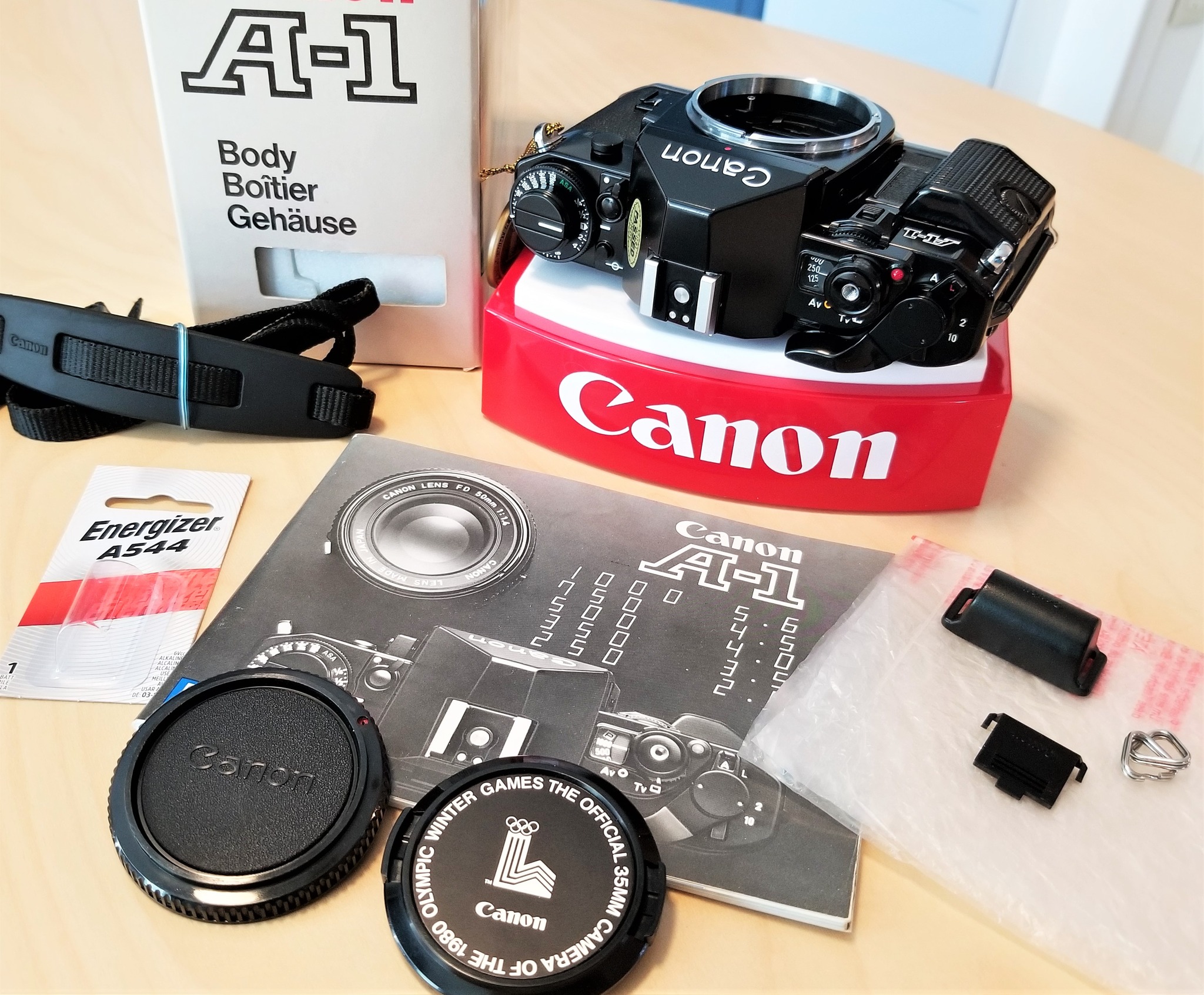 Canon A-1 camera with 70-210mm lens for weekend shoot