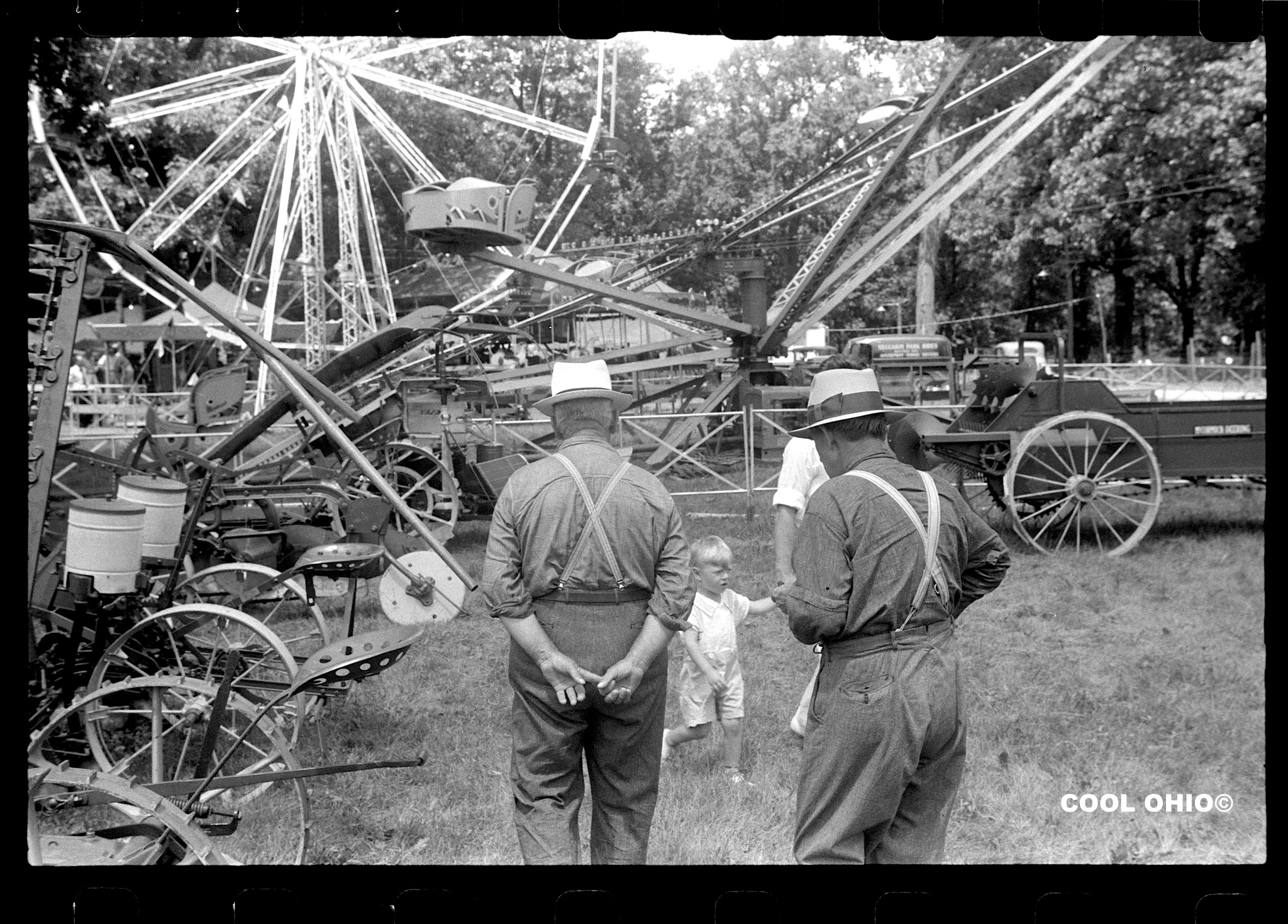 Cool - Farm machinery display and amusement rides at county fair ...
