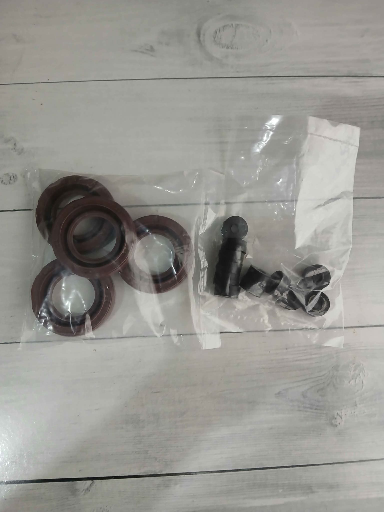 Sentra B13/B14 Tappet pan cover seal kit with bolt grommets. Call