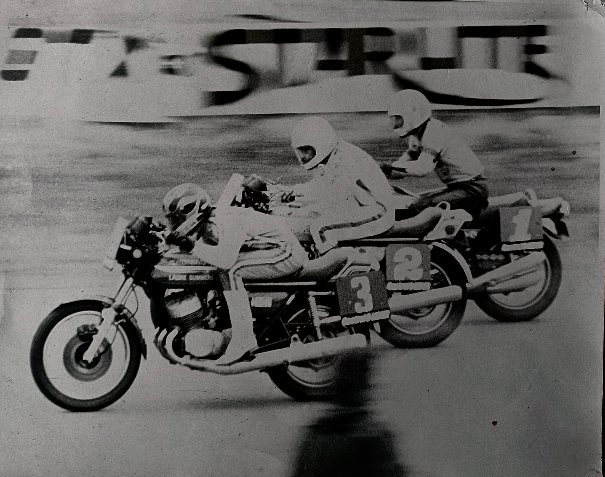 Redacted person in motorcycle racing