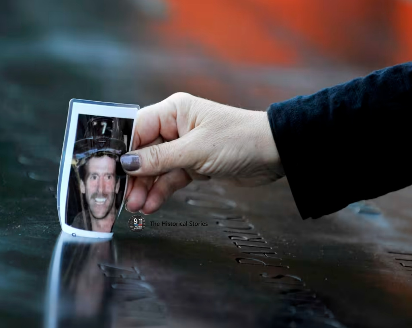 The Historical - Christine Gonda places a picture of firefighter George ...
