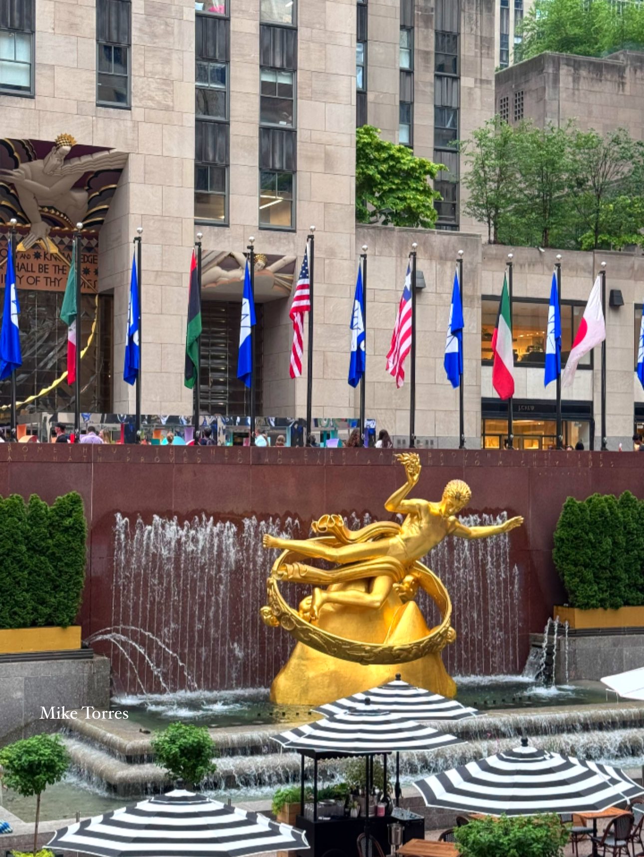 Mike - This golden statue in the waterfalls of Rockefeller Center is ...