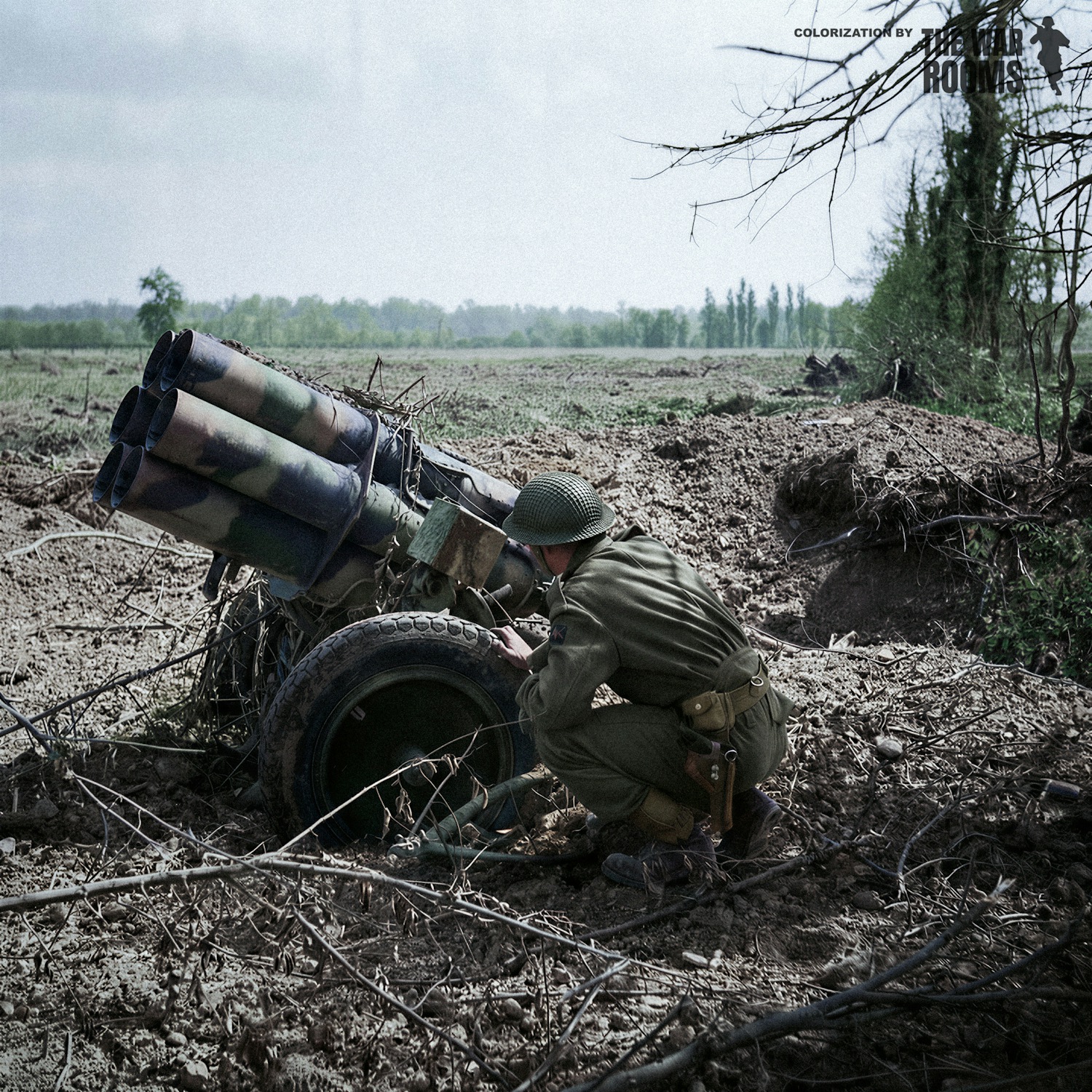 The War - A British soldier inspects an abandoned German Nebelwerfer ...