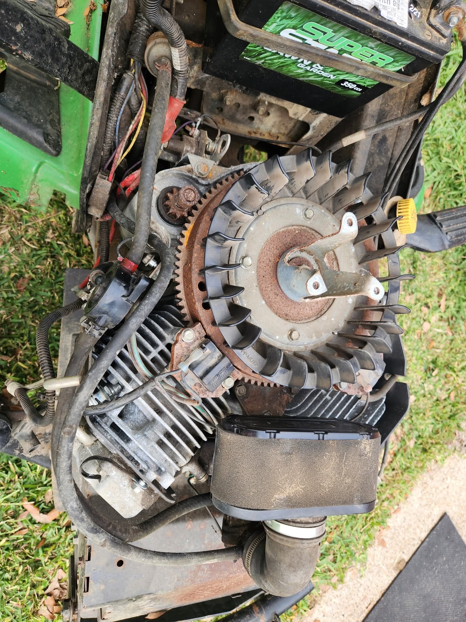 What causes worn exhaust valves on Kawasaki FS600V engines?